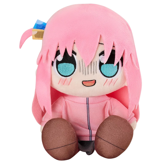 Plush toy with pink hair and outfit on a white background