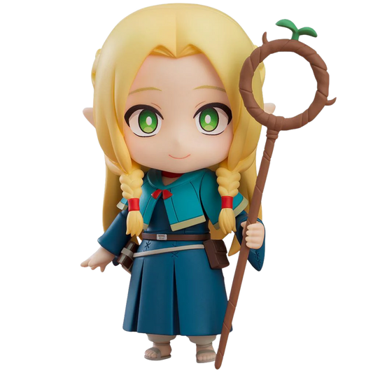 Toy figure of a character with blonde hair and green eyes, holding a staff, on a white background.