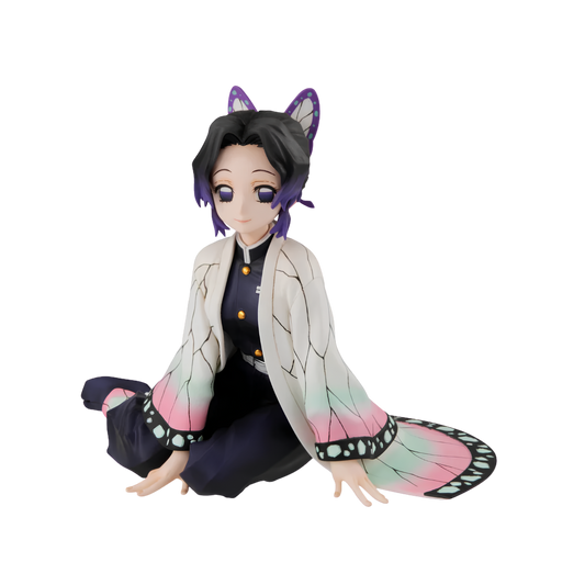 An anime collectible figure of Inosuke Hashibira from Demon Slayer, seated cross-legged. The figure features purple hair with cat-ear tips, a white butterfly-patterned haori jacket with pink and green gradient edges, and a black outfit underneath, set against a plain white background.