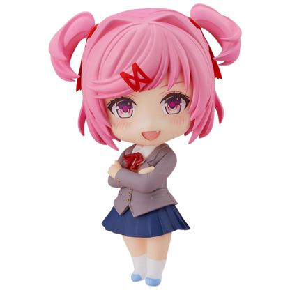 Anime character figurine with pink hair and a school uniform on a white background
