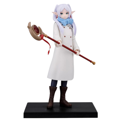 Anime character figurine holding a staff on a white background