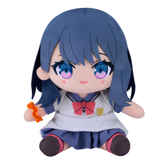 A chibi anime plush doll with dark blue hair, large blue-purple eyes, and a school uniform, sitting against a plain white background.