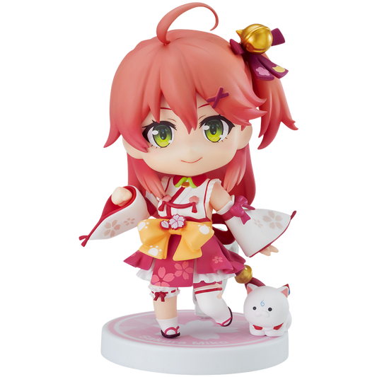 Anime character figurine with pink hair and green eyes on a white background