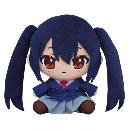 A chibi-style plush doll with long dark blue pigtails, large brown eyes, and a school uniform outfit consisting of a dark blue jacket, light blue skirt, white shirt, and red tie, shown against a plain white background.