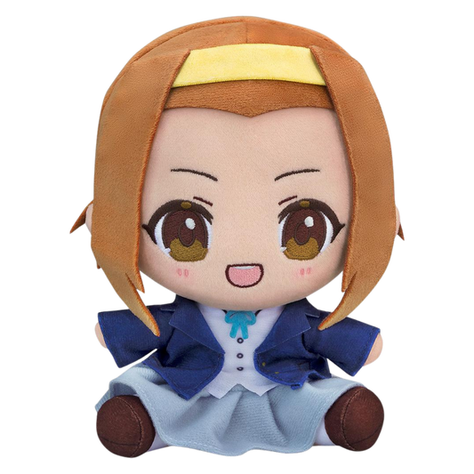 A chibi-style plush doll with short orange-brown hair, a yellow headband, large brown eyes, and a schoolgirl outfit with a navy blazer, white blouse, light blue skirt, and small teal bow, shown on a plain white background.