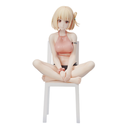 Anime character figurine sitting on a chair against a white background