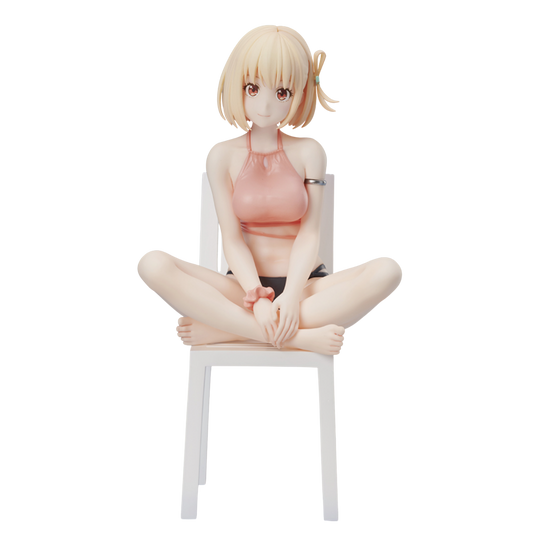 Anime character figurine sitting on a chair against a white background