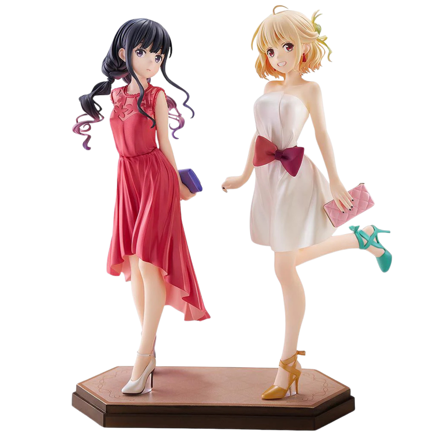 Two anime-style figurines of women in dresses on a white background