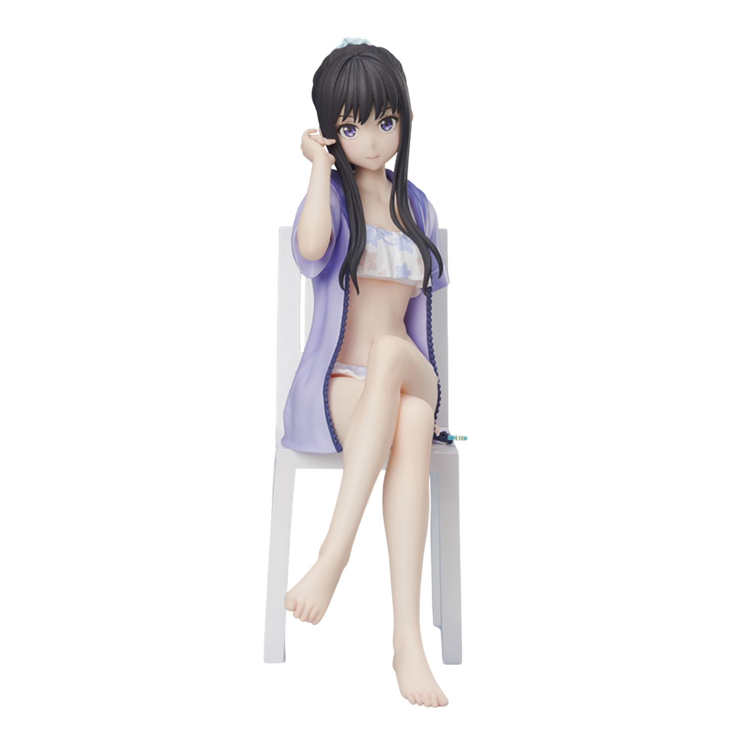 Figurine of a character in a swimsuit and cover-up on a white background