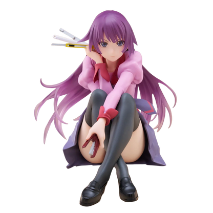 Anime character figurine with purple hair and pink outfit on a white background