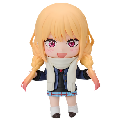A chibi-style anime figure with long blonde pigtails, pink eyes, and a white scarf, wearing a navy cardigan, blue plaid skirt, and white socks, isolated on a black background.