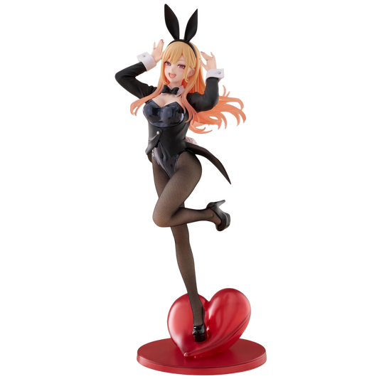 Figure of a character in a black outfit with bunny ears on a red heart-shaped base against a white background