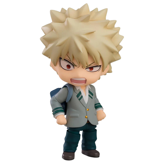 A chibi-style collectible figure of a spiky blond character with an angry expression, wearing a gray blazer with green stripes, dark teal pants, and brown shoes, shown on a plain white background.