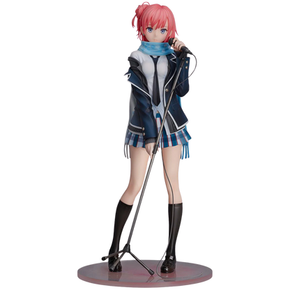 Anime character figurine with pink hair and microphone on a white background