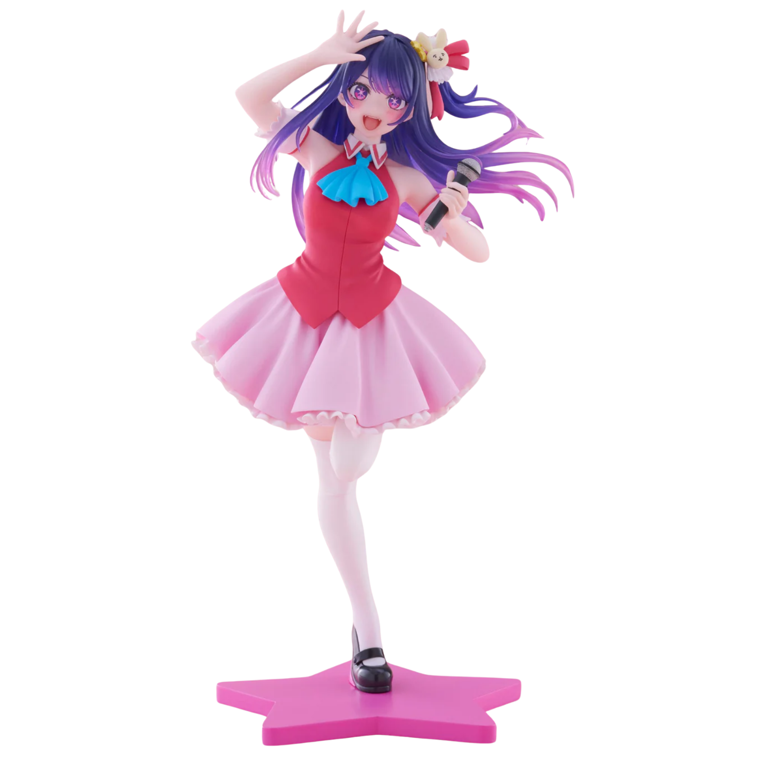 Figure of a character with purple hair and a pink outfit holding a microphone on a white background