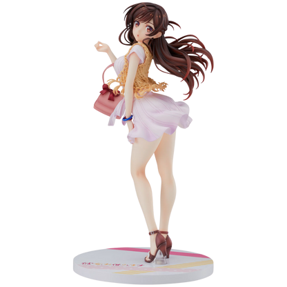Anime character figurine with long brown hair and a pink skirt on a white background