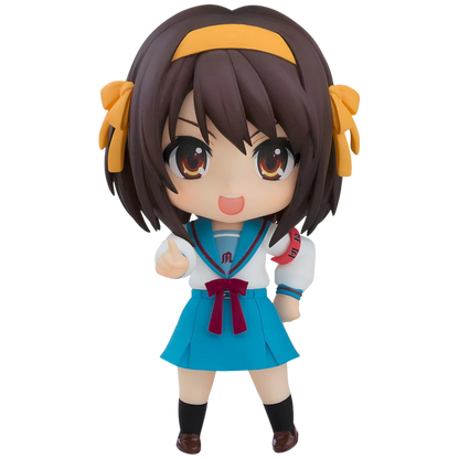 Anime character figurine with brown hair and a blue school uniform on a white background