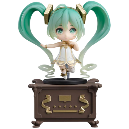 Anime character figurine with green hair and white dress on a decorative stand