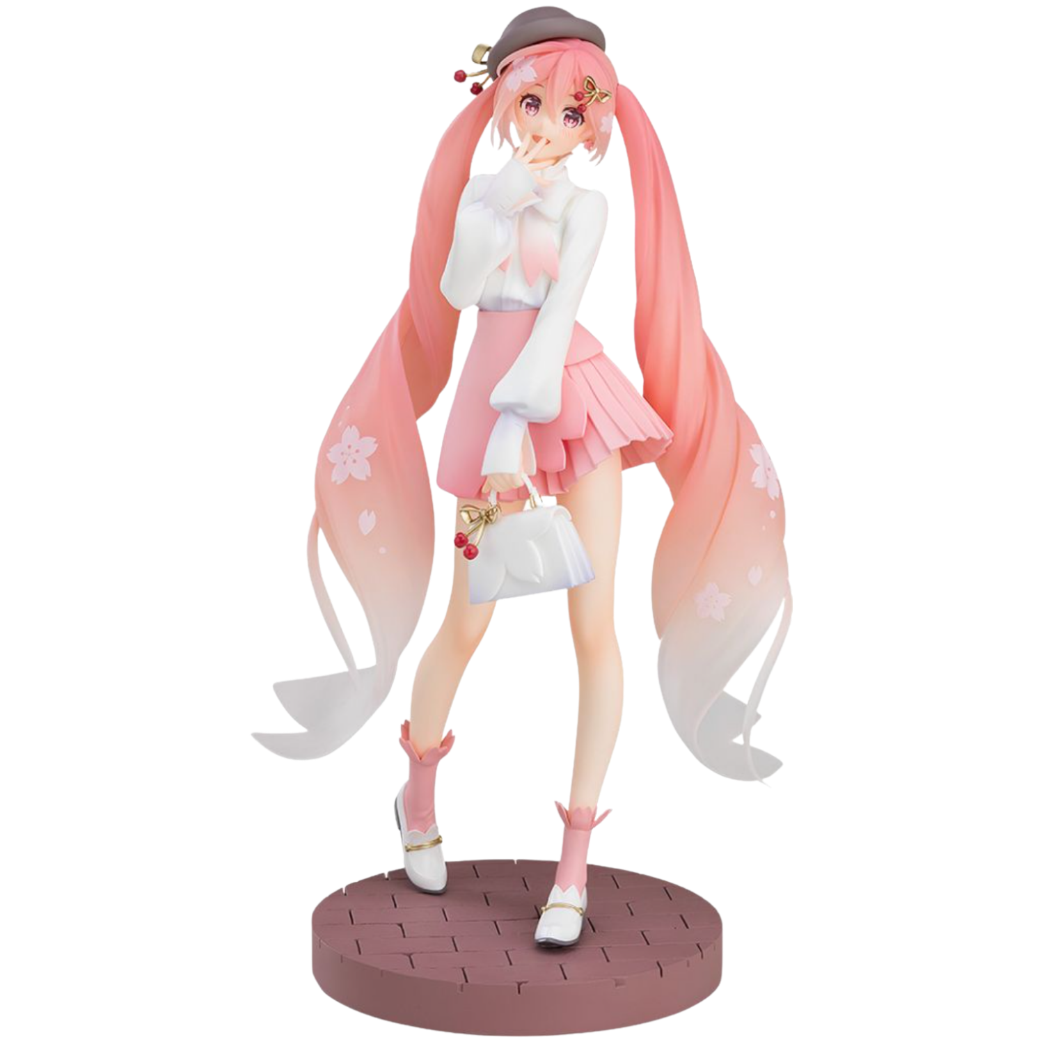 Anime character figurine with long pink hair and a white outfit on a white background