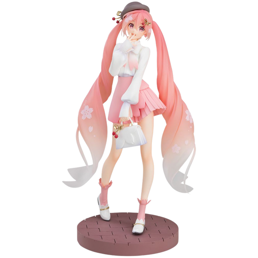 Anime character figurine with long pink hair and a white outfit on a white background