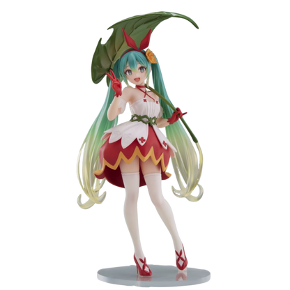 Anime character figurine with green hair and a red and white outfit on a white background
