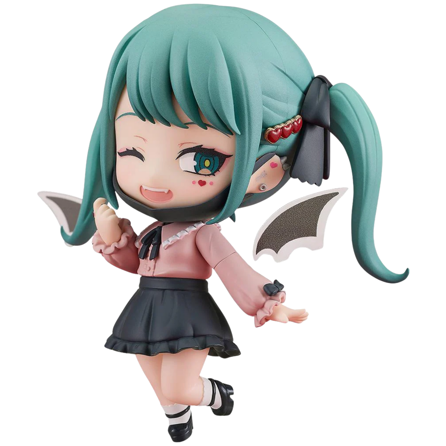 Anime character figurine with green hair and a pink outfit on a white background