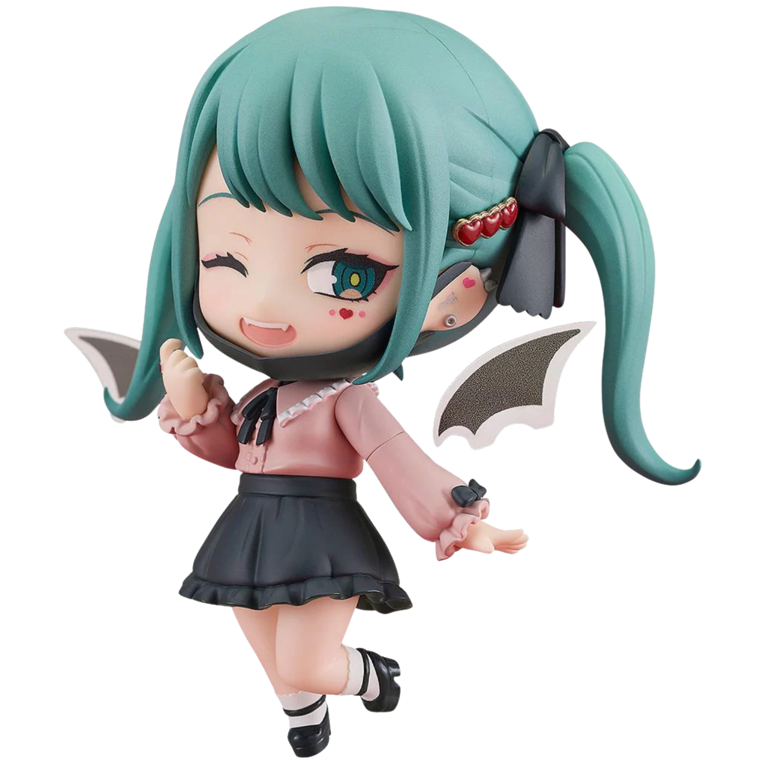 Anime character figurine with green hair and a pink outfit on a white background