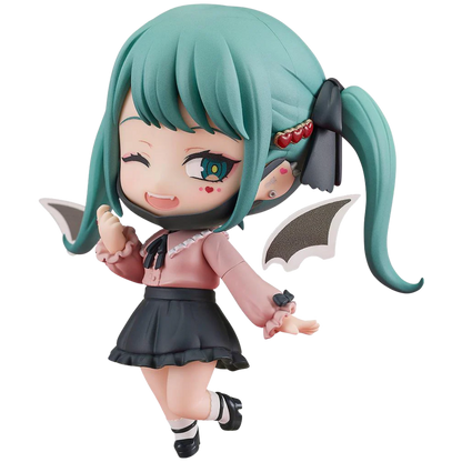 Anime character figurine with green hair and a pink outfit on a white background