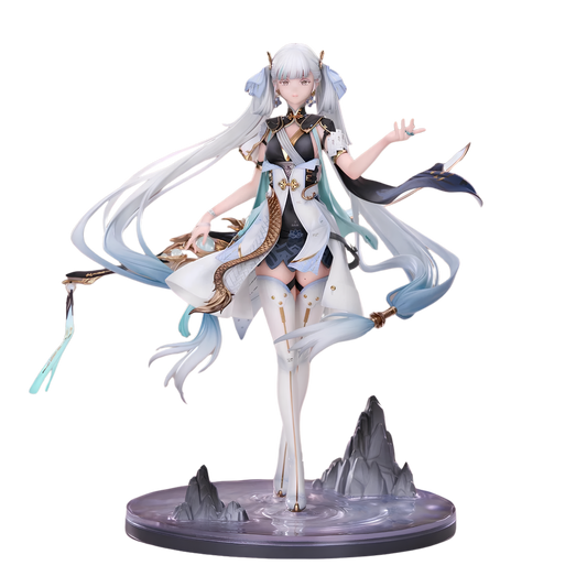 A detailed anime-style figurine of a female character with long white and blue hair, wearing a white and black outfit with teal accents, posed dynamically on a circular base with small gray mountain shapes.