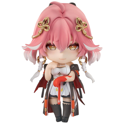 Anime character figurine with pink hair and butterfly accessories on a white background